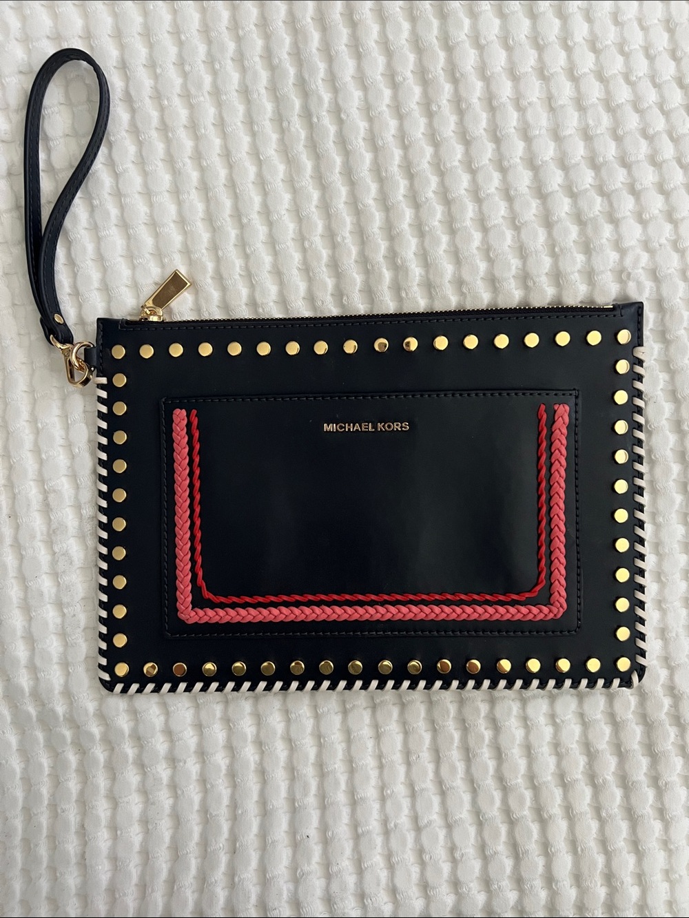 MICHAEL KORS Navy Leather Wristlet Clutch with pink Braided Trim and Gold Studs